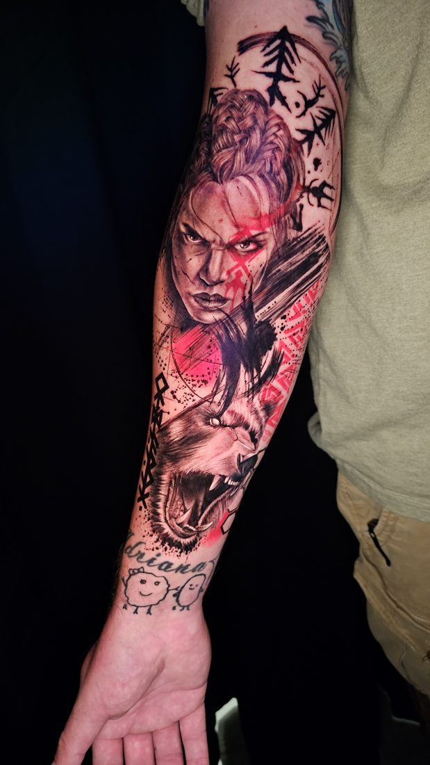 Viking-themed forearm sleeve in black and grey with red accents